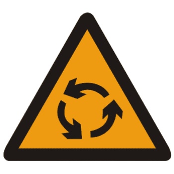 环形交叉:有的环形交叉路口，由于受线形限制或障碍物阻挡，此标志设在面对来车的路口的正面。